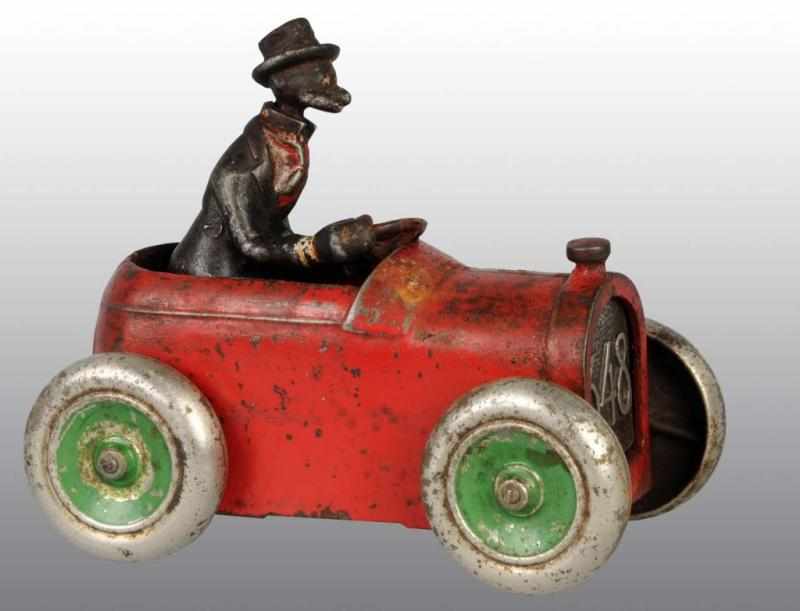 Appraisal: Cast Iron Arcade Andy Gump Automobile Toy Description American One