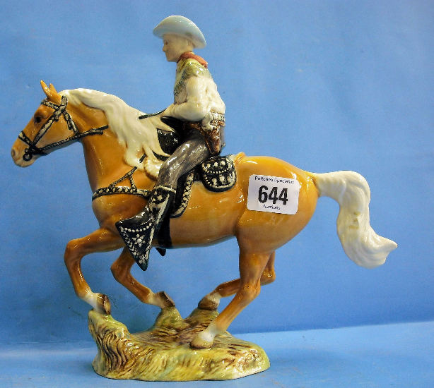 Appraisal: Beswick Cowboy on Galloping Palomino Horse restored ears