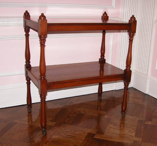 Appraisal: English Victorian Mahogany Tea Trolley having two shelves and turned