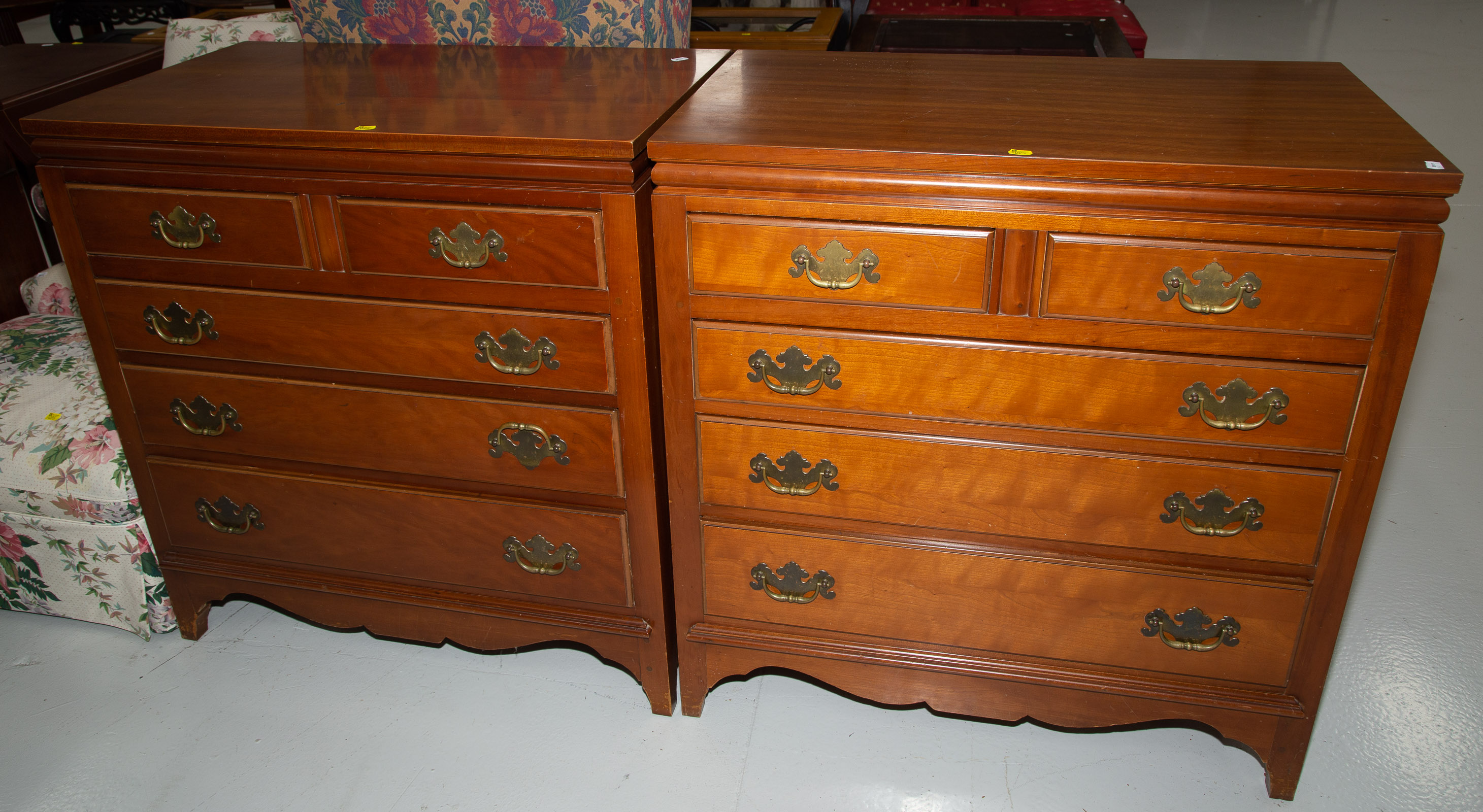 Appraisal: A PAIR OF COLONIAL STYLE CHERRY CHESTS OF DRAWERS National