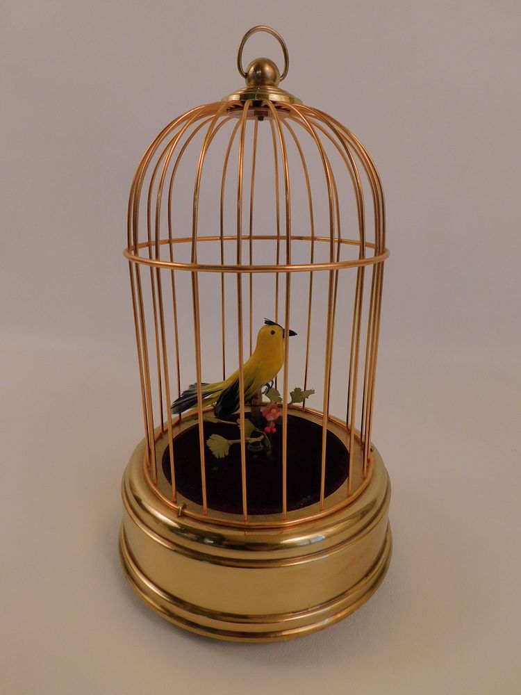 Appraisal: SINGING BIRD IN CAGE AUTOMATON th century automaton singing canary