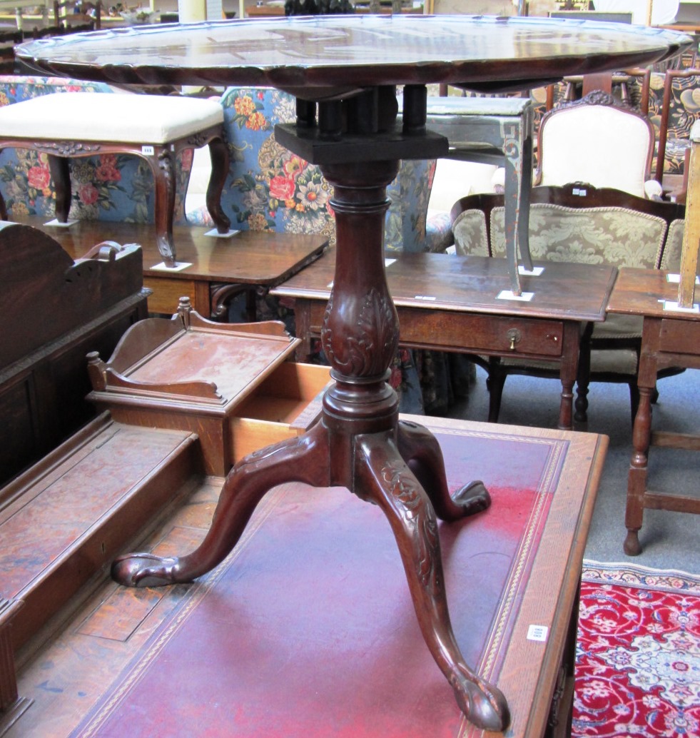 Appraisal: A th century mahogany tripod table the pie crust snap