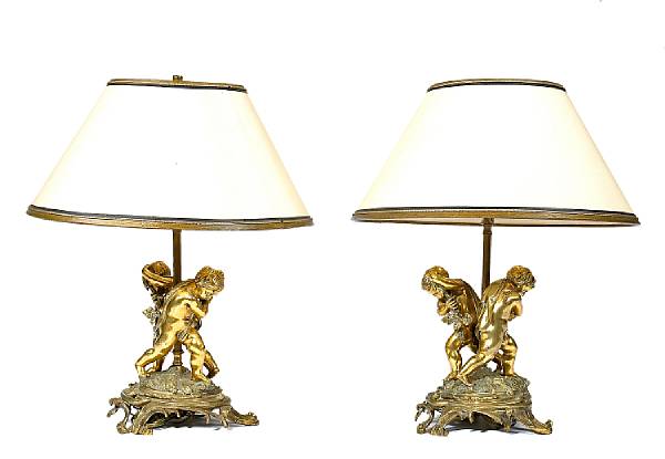 Appraisal: A pair of Belle poque bronze figural chenets now as