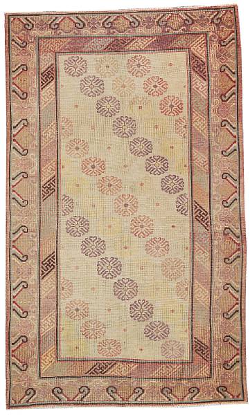 Appraisal: A Khotan carpet early th century The beige field with