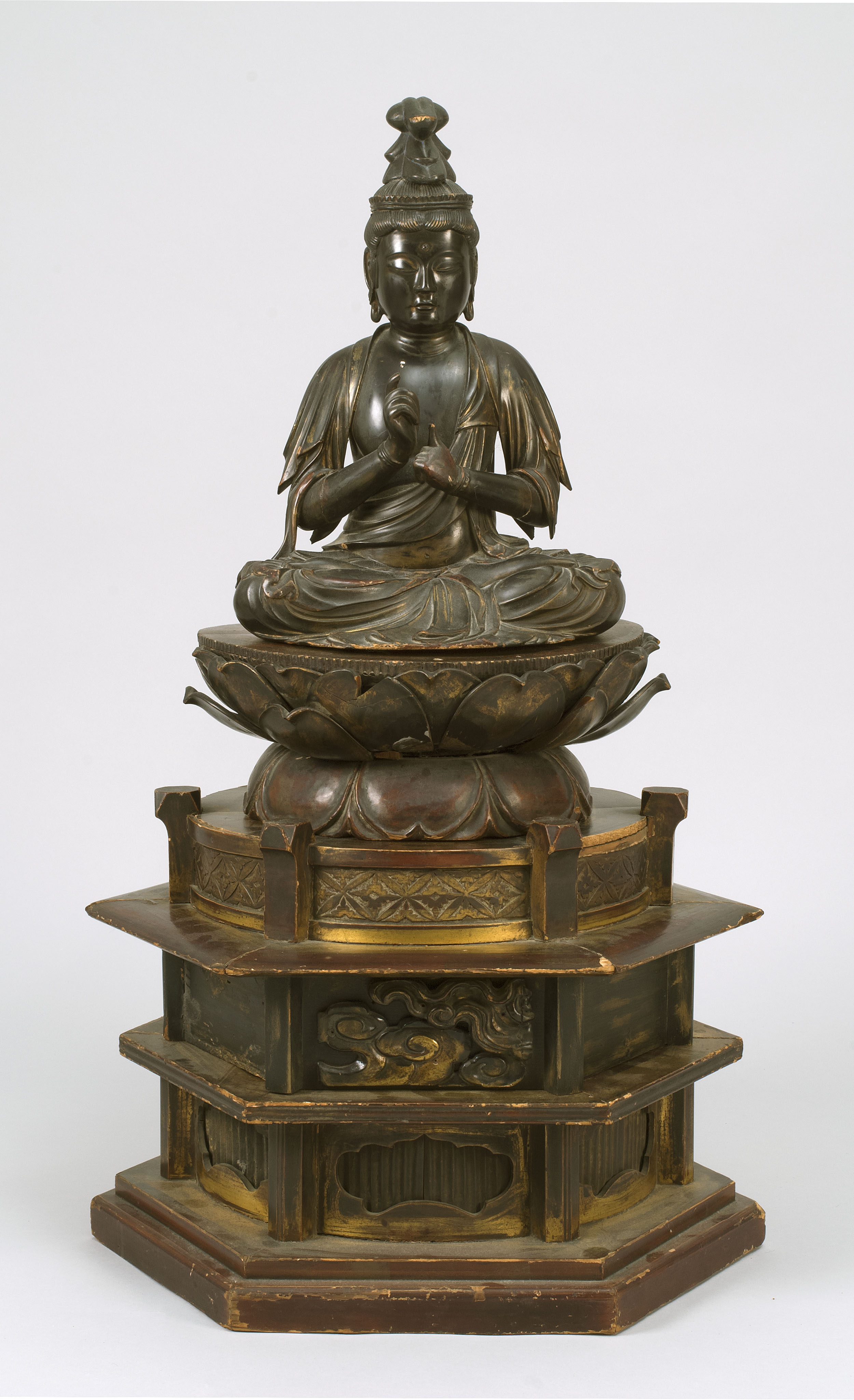 Appraisal: LACQUERED WOOD BUDDHA Edo PeriodSeated on a lotus throne with