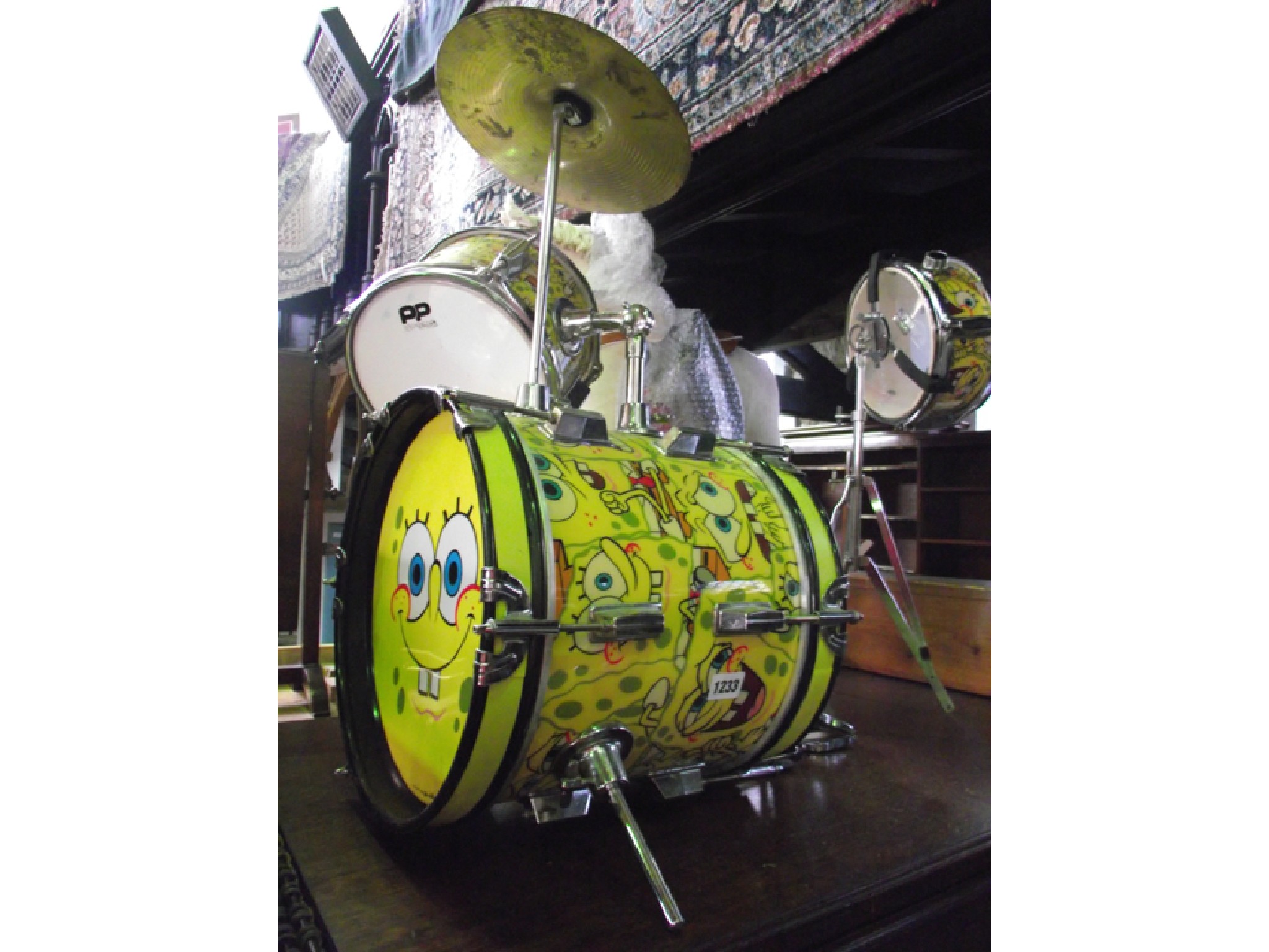 Appraisal: A child's drum kit arrangement brightly painted detail comprising three