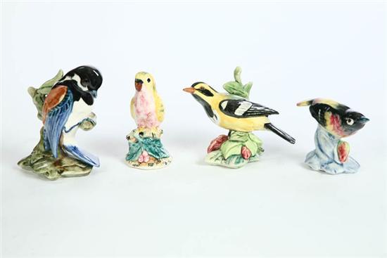 Appraisal: FOUR STANGL POTTERY BIRDS A Lovebird h A Black Throated