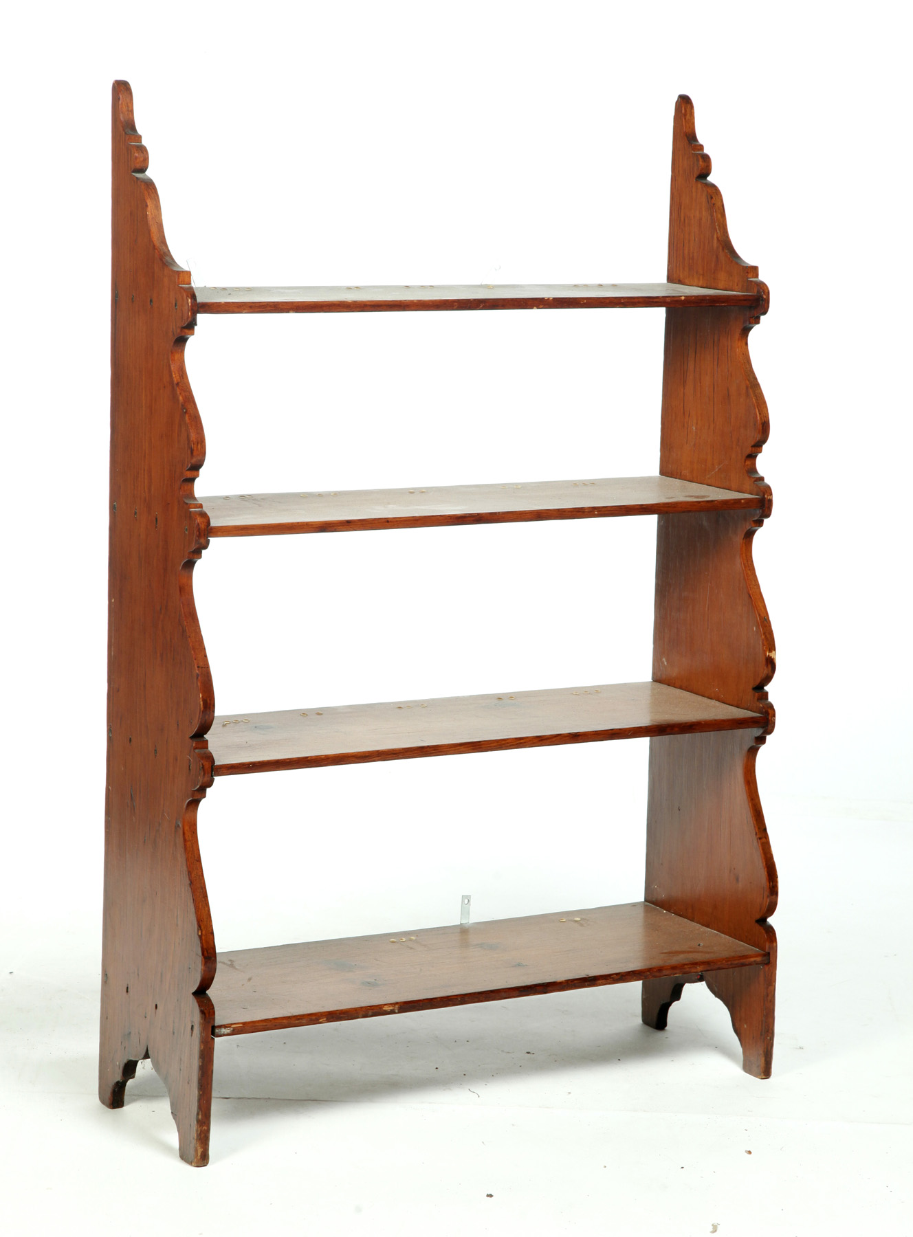 Appraisal: AMERICAN HANGING SHELF Early th century pine Scrollcut ends and