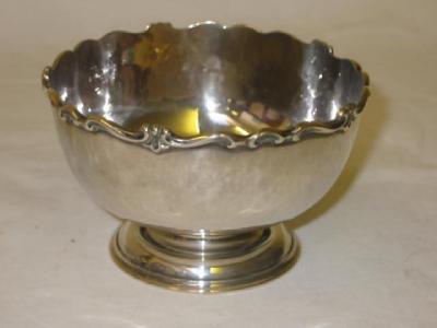 Appraisal: A SUGAR BOWL of circular form with scroll moulded rim