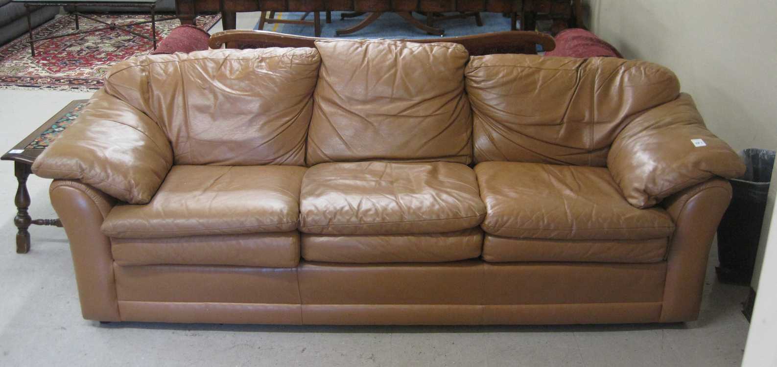 Appraisal: A CONTEMPORARY LEATHER SOFA Prestige Leather Furniture Co adobe brown