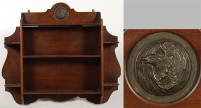 Appraisal: An Arts and Crafts mahogany shelf inset with a patinated