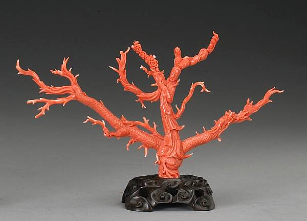 Appraisal: A carved coral branch th Century The thinly sectioned branch