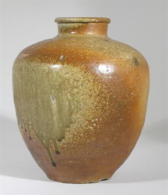 Appraisal: A massive ovoid vase covered in a running cream and