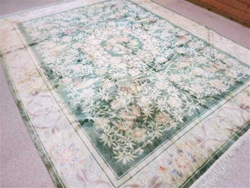 Appraisal: A CONTEMPORARY CHINESE FAUX SILK CARPET hand knotted in a