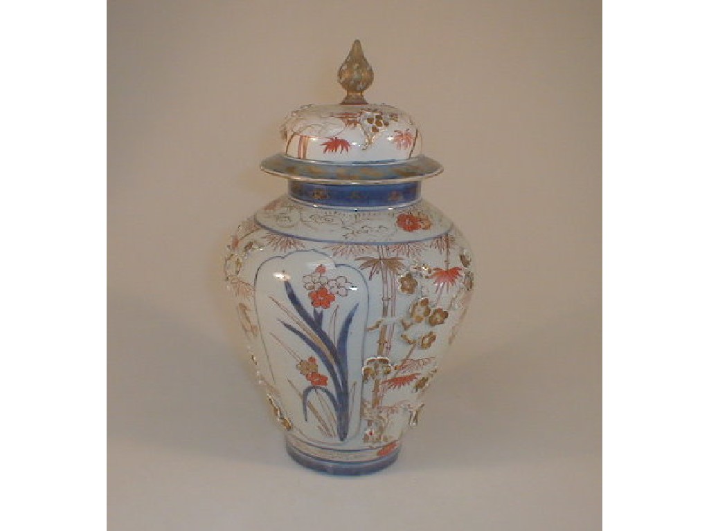 Appraisal: An Imari ovoid vase and cover painted with bamboo flowers