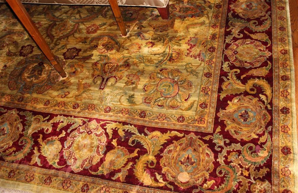 Appraisal: INDO PERSIAN TABRIZ WOOL FLORAL RUG overall scrolling foliate design