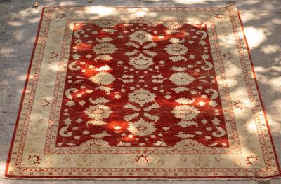 Appraisal: A Ziegler design carpet Pakistan the madder field with all-over