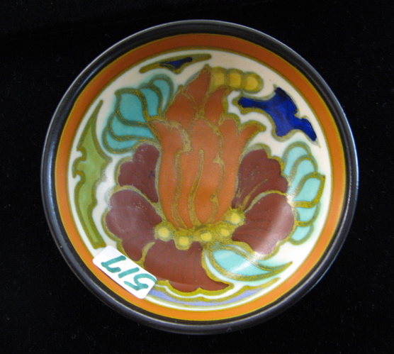 Appraisal: A DUTCH GOUDA ART POTTERY MASTER SALT having multi-colored flower