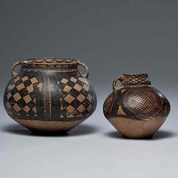 Appraisal: Chinese Neolithic Vessels Chinese two neolithic ovoid-shaped pottery vessels both