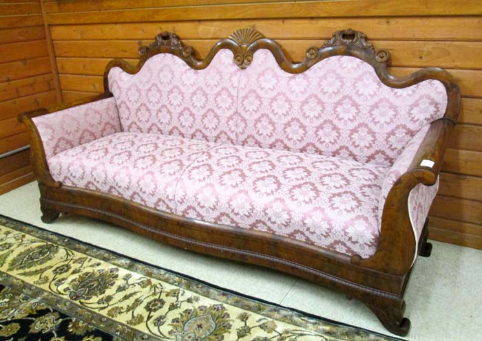 Appraisal: EMPIRE MAHOGANY SERPENTINE-BACK SOFA American mid- th century with later