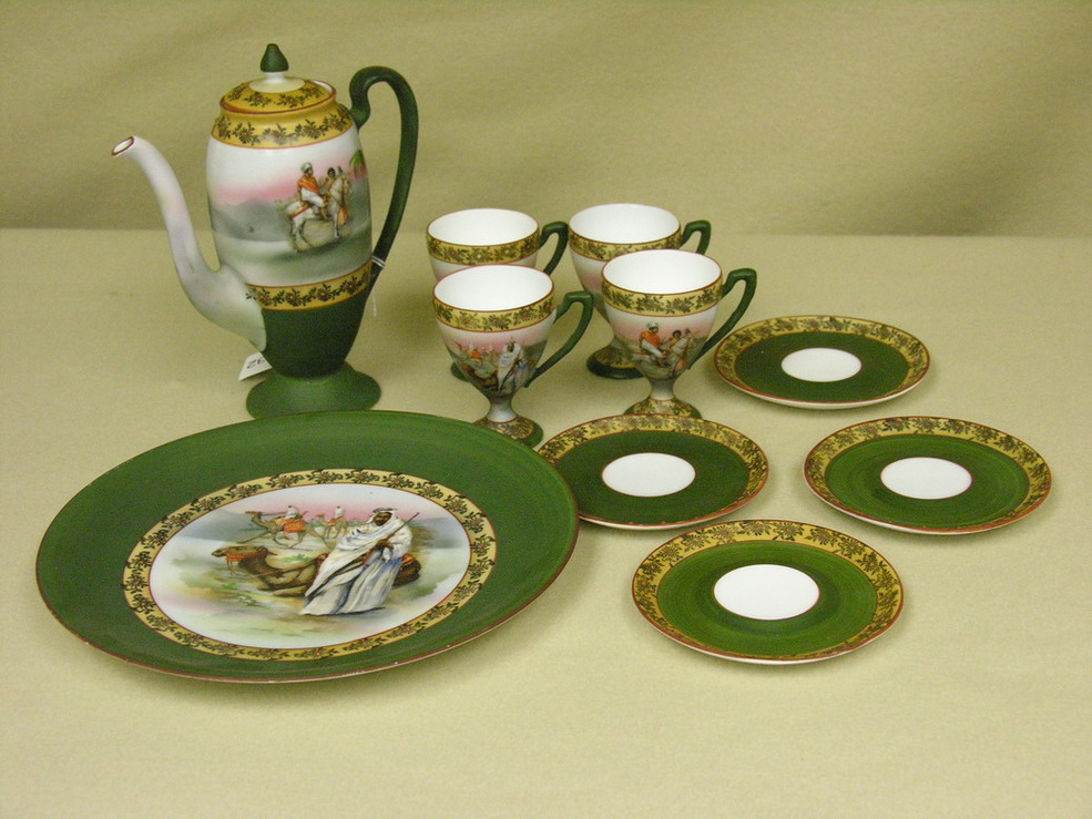 Appraisal: PC ROYAL BAYREUTH SCENIC ARABIAN SET Pitcher size Four footed