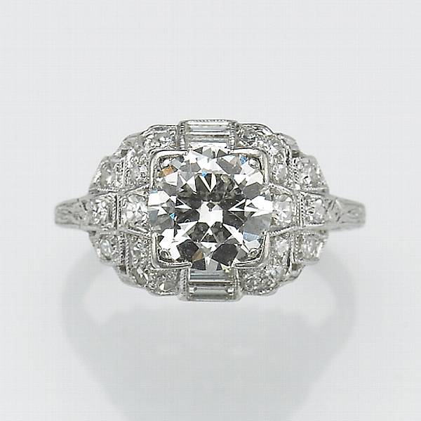 Appraisal: An art deco diamond and platinum ring center diamond weighing