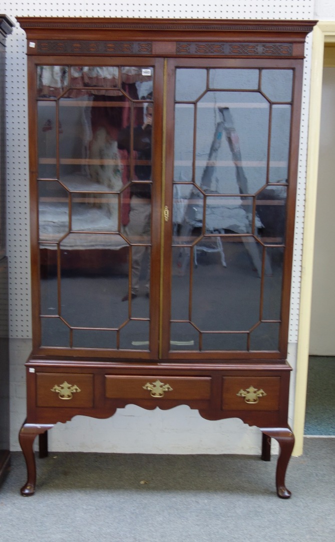 Appraisal: An th century and later display cabinet on stand the