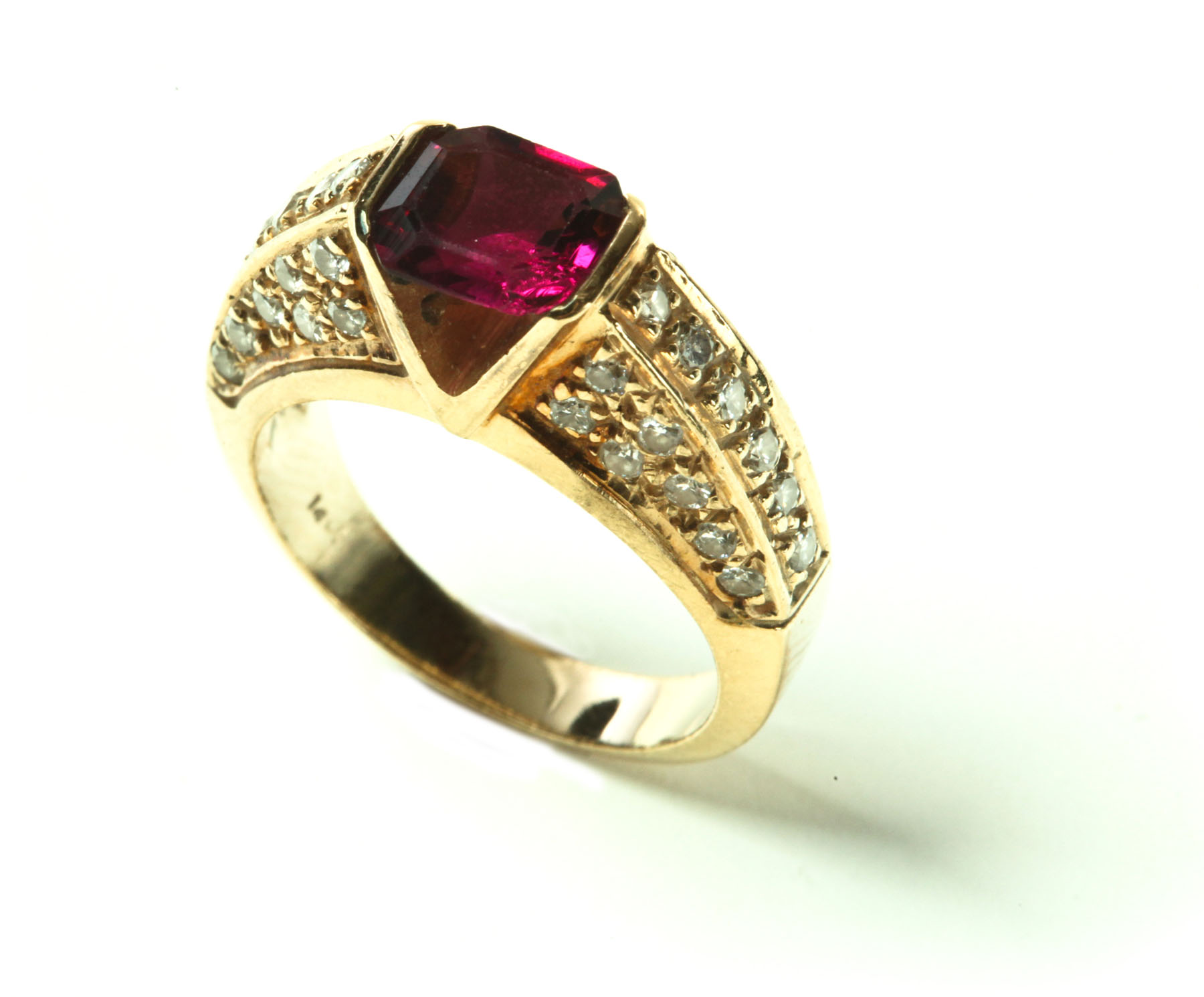 Appraisal: LADIES' RING Twentieth century Emerald cut purple stone channel set