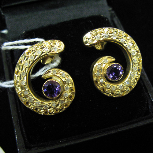 Appraisal: PAIR OF AMETHYST CITRINE DIAMOND AND EIGHTEEN KARAT GOLD EARRINGS