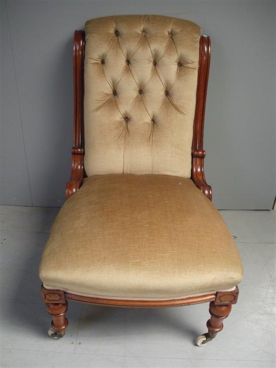 Appraisal: th Century mahogany framed button back nursing chair on turned