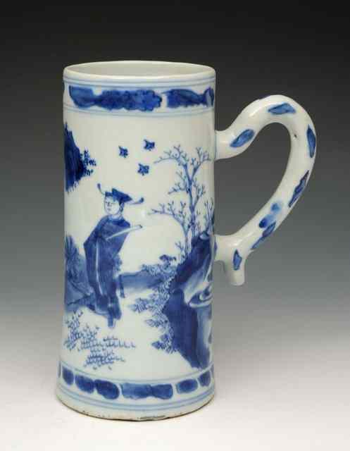 Appraisal: A CHINESE TRANSITIONAL BLUE AND WHITE TANKARD decorated with a