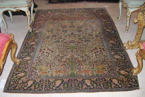 Appraisal: KIRMAN LAVER old White ground opulently decorated in attractive pastel