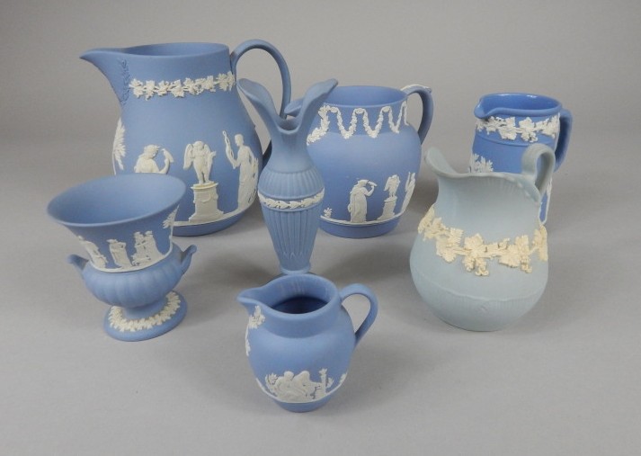 Appraisal: Various Wedgwood Jasperware jugs each with typical sprig decoration and