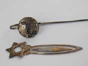 Appraisal: A silver bookmark with star of David terminal and another