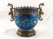 Appraisal: A Japanese cloisonn enamelled cachepot with gilt dragon handles and