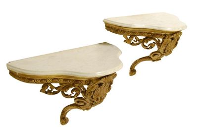 Appraisal: A pair of th century giltwood and gesso wall mounted