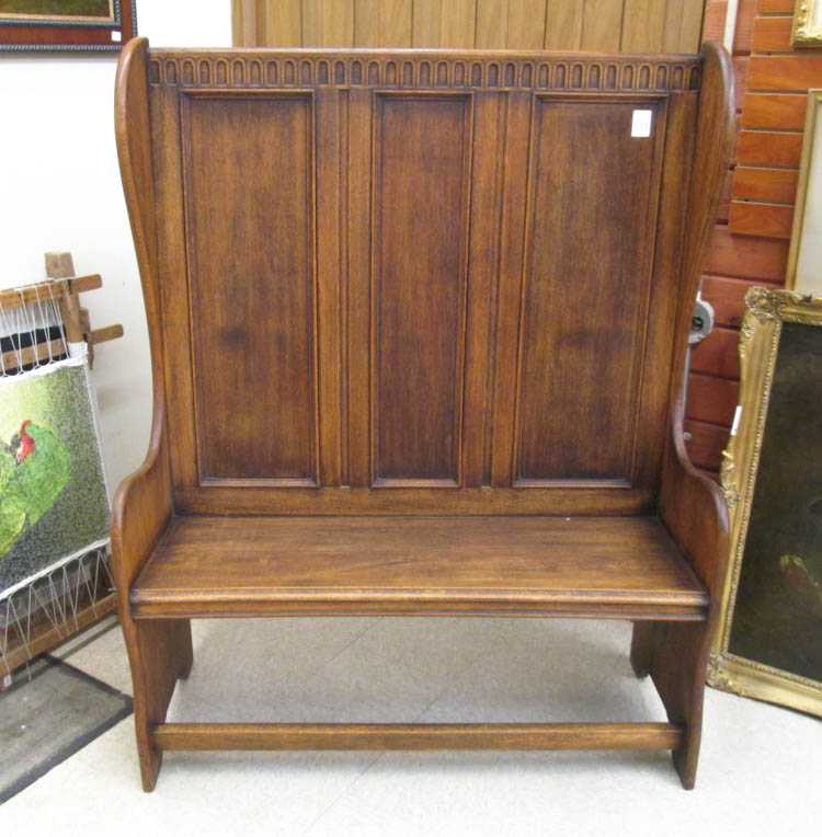 Appraisal: AN EDWARDIAN OAK DEACON'S BENCH Maple Co London c having