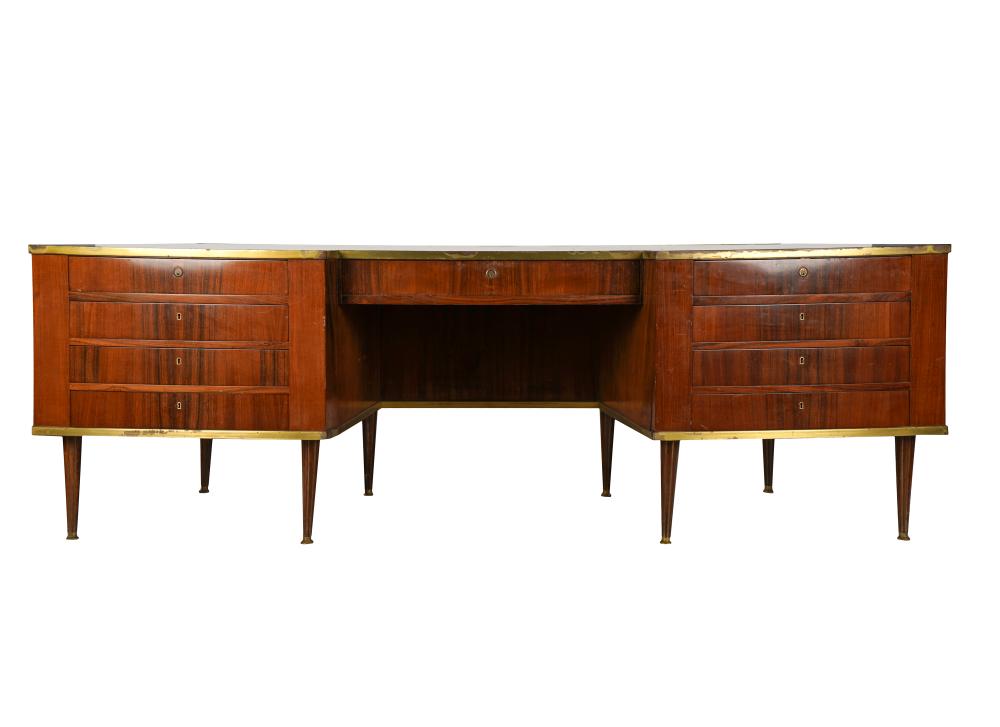 Appraisal: VINTAGE ITALIAN MODERN DESKmahogany and brass of curved outline with