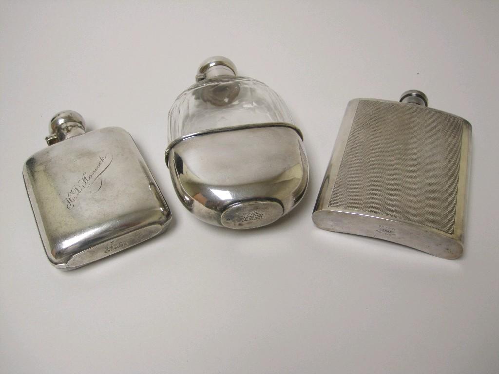 Appraisal: Three plated Spirit Flasks one engine turned one engraved