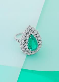 Appraisal: A Platinum Emerald and Diamond Ring dwts A Platinum Emerald