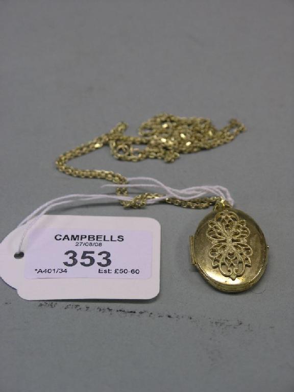 Appraisal: A ct gold oval locket on ct gold chain grams