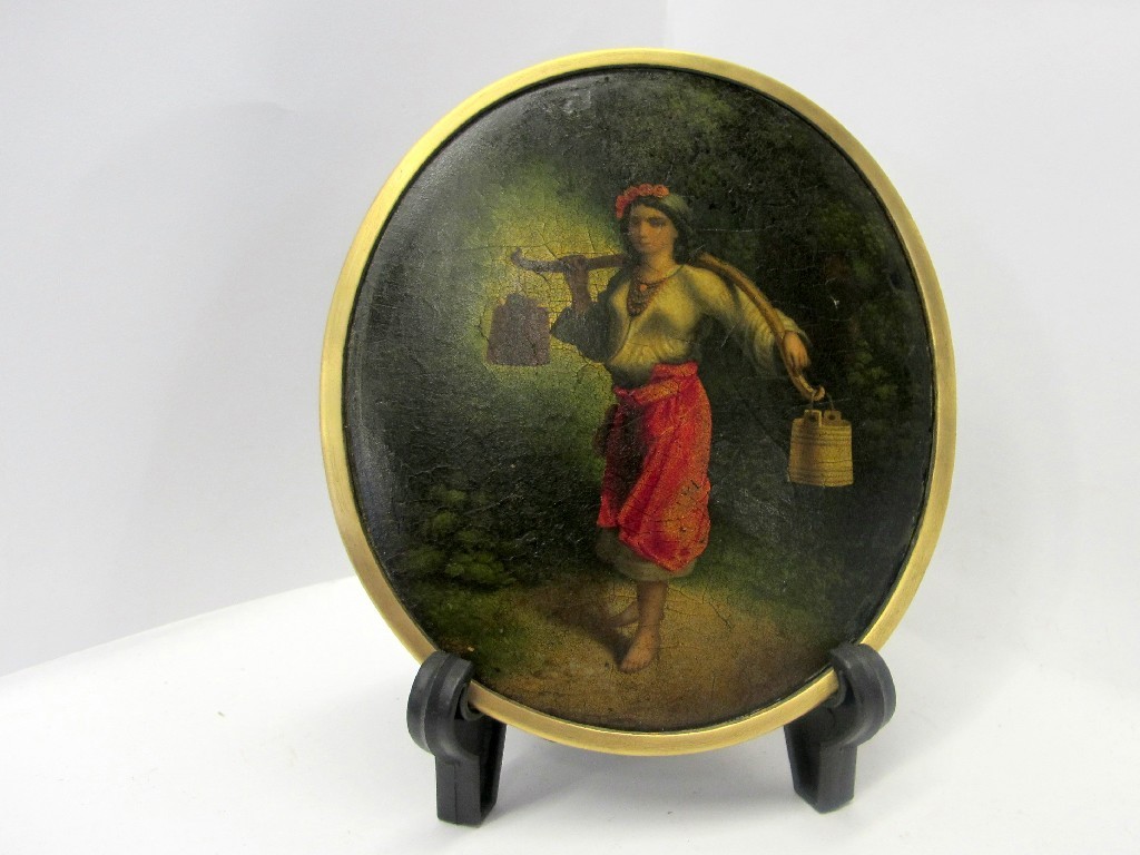 Appraisal: Oval framed oil of a girl in Ukrainian dress