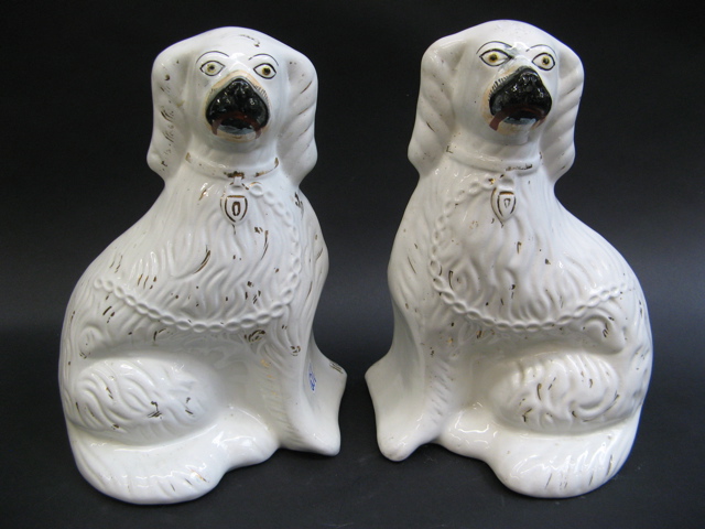 Appraisal: PAIR IRONSTONE MODELS OF STAFFORDSHIRE DOGS English gold decorated on