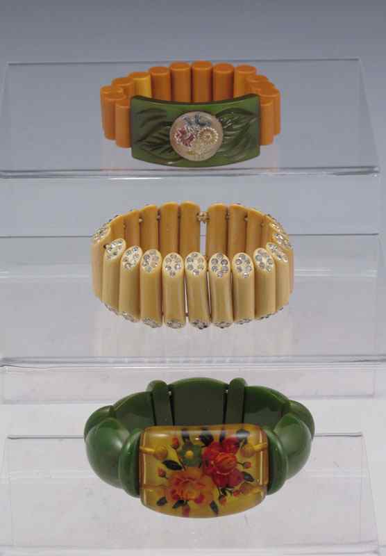 Appraisal: THREE BAKELITE STRETCH BRACELETS Reverse carved apple juice with green