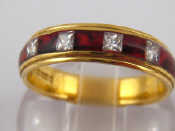 Appraisal: An carat gold red enamel and diamond ring size N