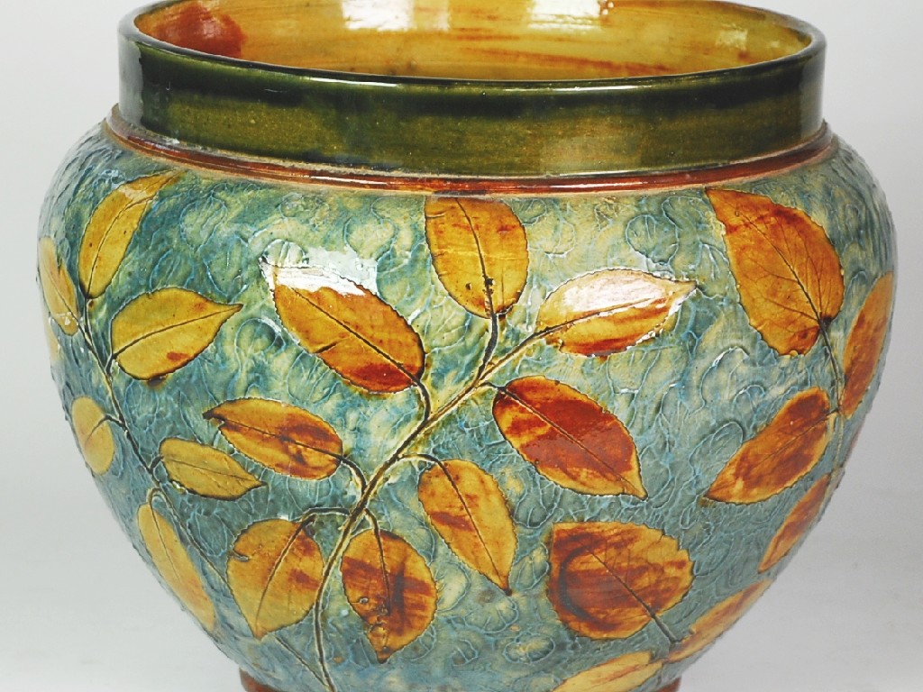 Appraisal: LARGE DOULTON LAMBETH STONEWARE AUTUMN LEAVES DESIGN JARDINERES of cauldron