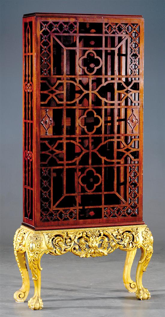 Appraisal: Chinese Chippendale style mahogany and giltwood display cabinet latticework upper