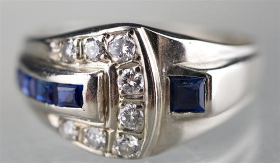 Appraisal: KT white gold blue sapphire and diamond ring Ring is