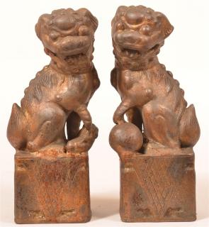 Appraisal: Pair of Oriental Cast Metal Foo Dogs Pair of Oriental