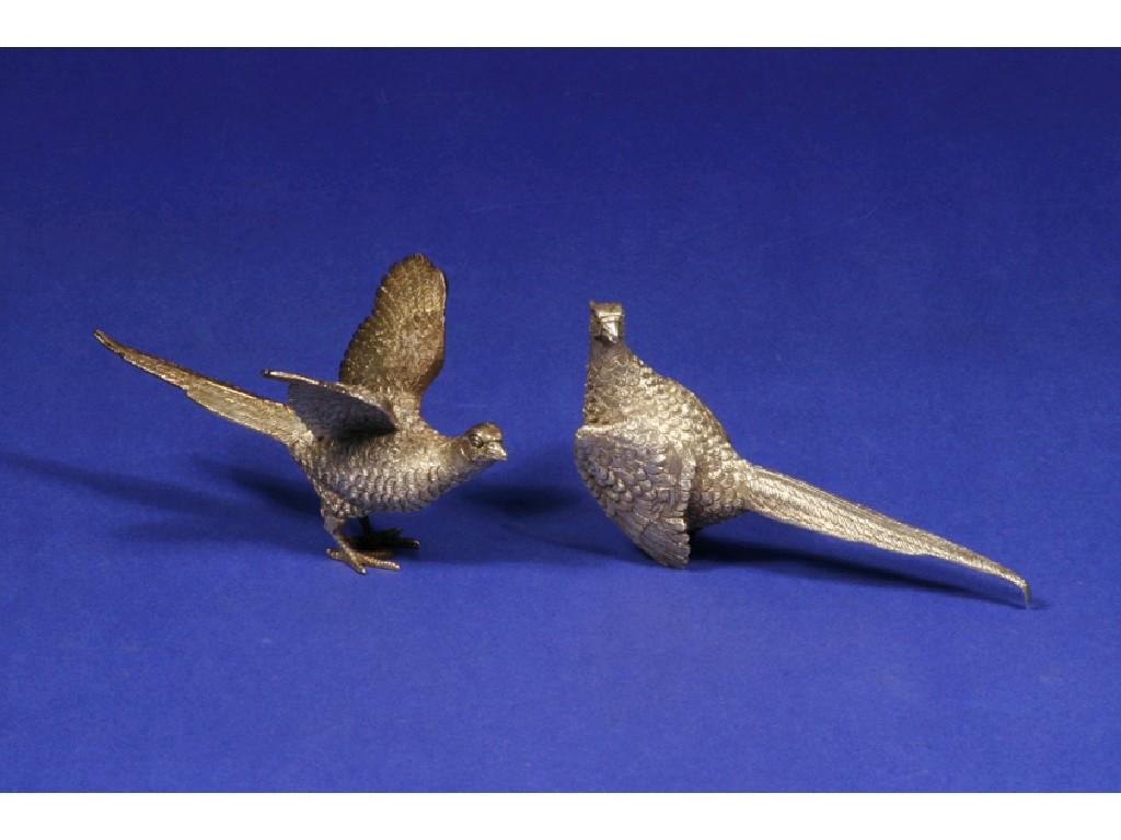 Appraisal: A MODERN SILVER MODEL OF A PARTRIDGE and a similar